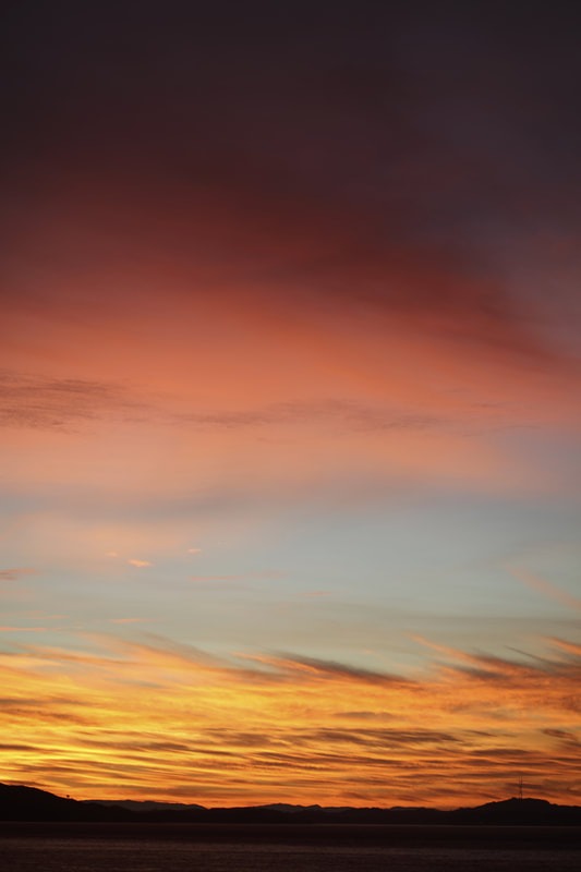 Fire and Bruise at the Edge of Day